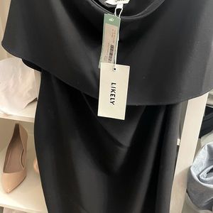 LIKELY  Dress black Size 4 Off-the-shoulder looks beautiful on, good quality